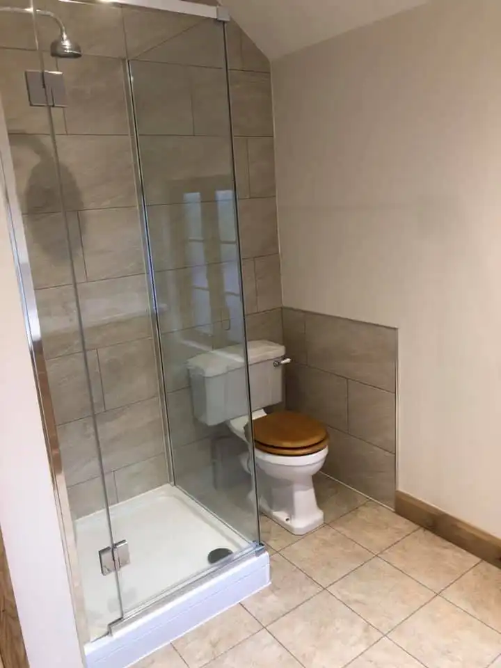 Completed bathroom installation showing modern design and quality finishes